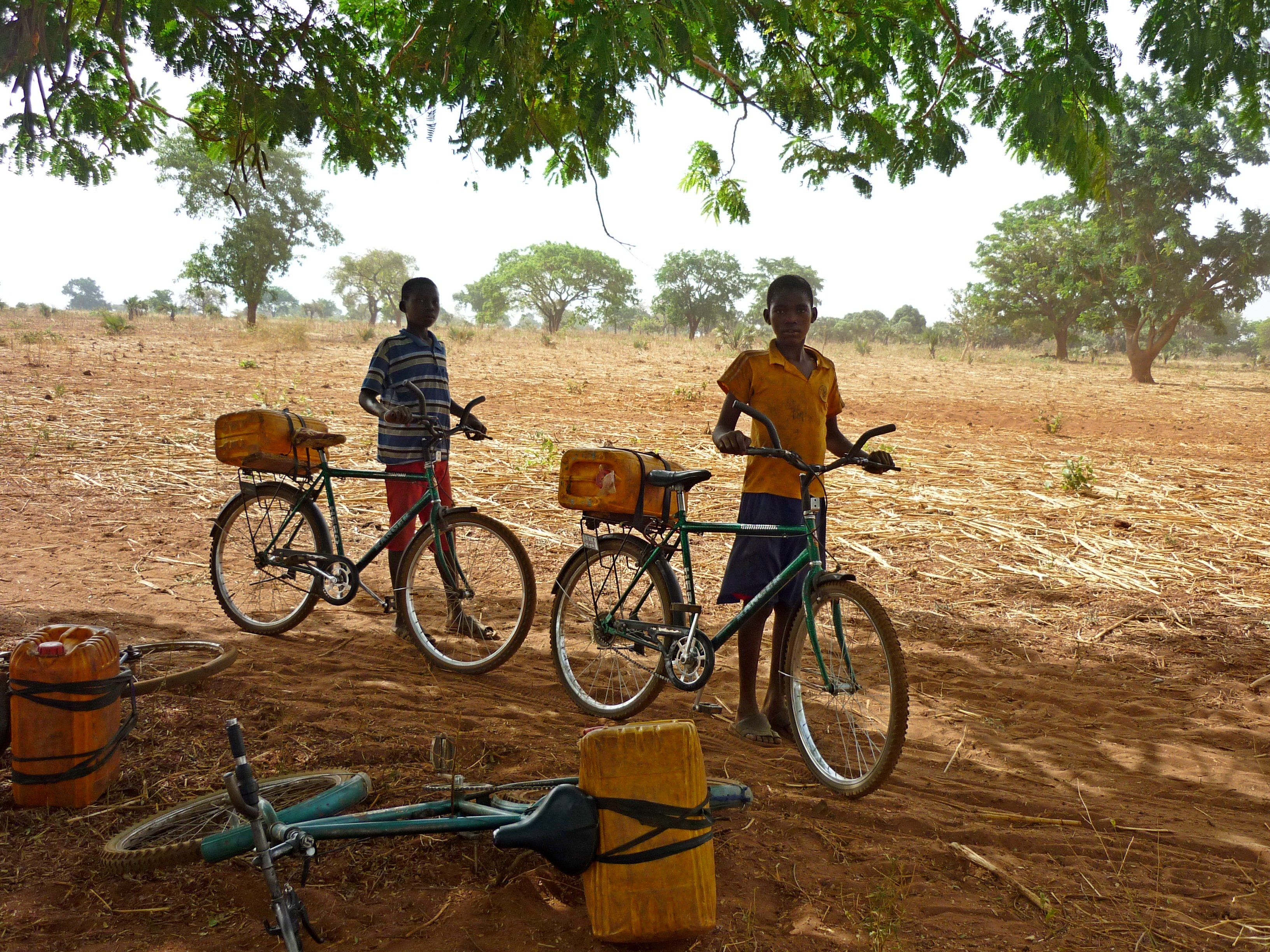 Fetching water by bike Chad (c) J.L. Couture 