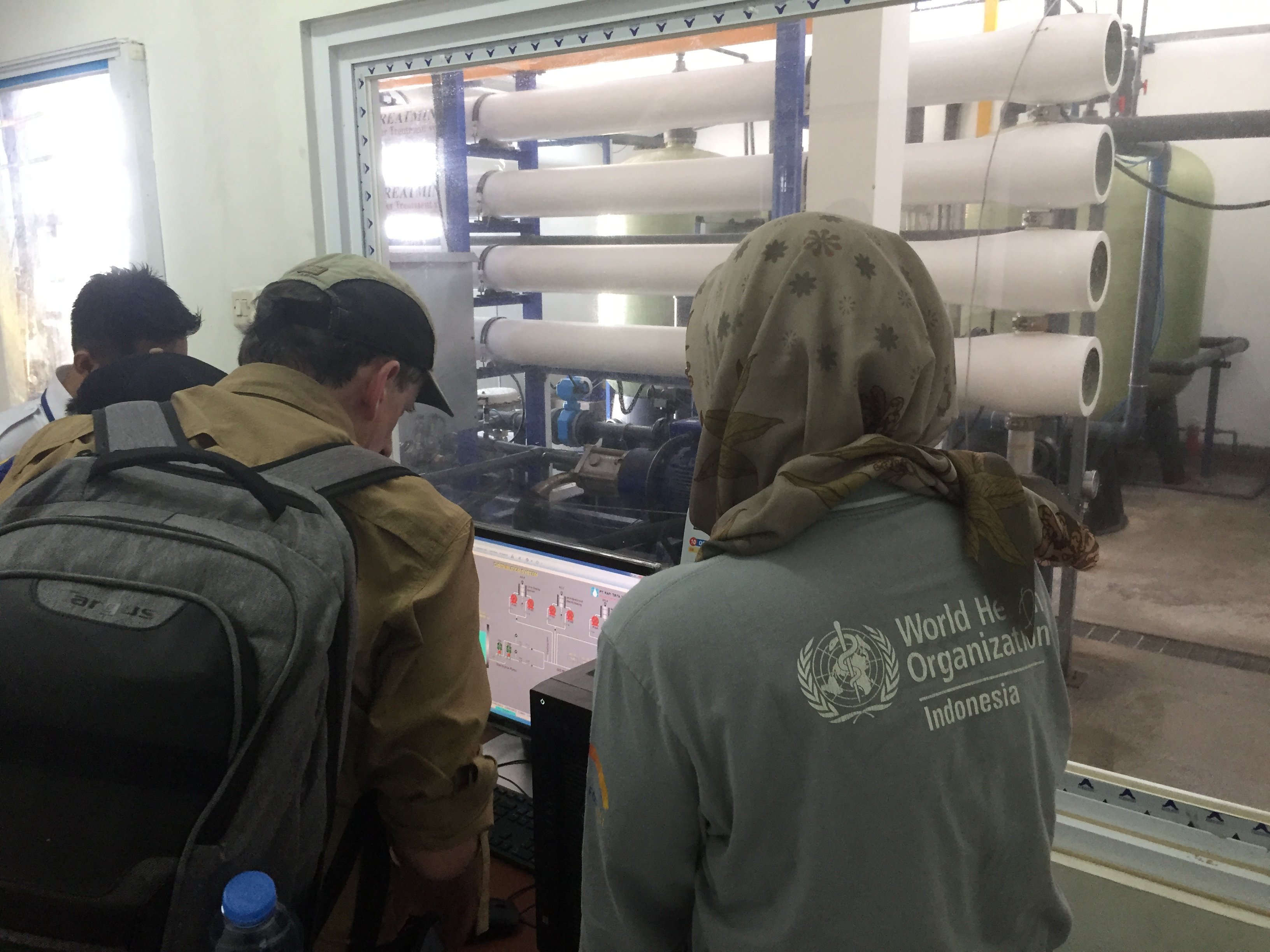 WHO staff test water quality